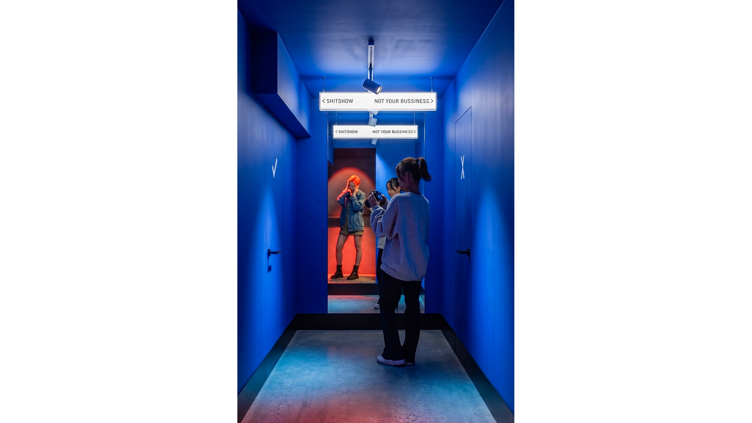 Beton Vienna — Blue-lit lower-floor corridor